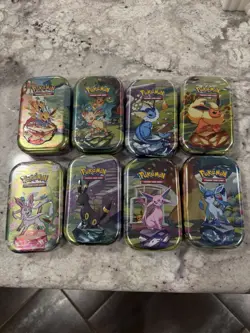 Pokemon TCG Prismatic Evolutions Mini Tins Set of 8 Brand New Factory Sealed - Image 1