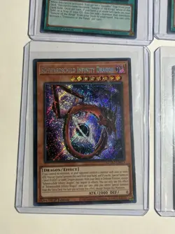Yu-Gi-Oh! 4 Card LOT 2 Treasures of the Kings and 2 Schwarzchild Infinity Dragon - Image 4