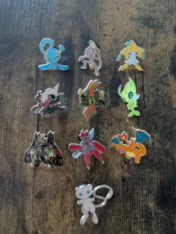 Official Pokemon Enamel Pin Lot of 10! NEW Mew, Charizard, Celebi etc! - Image 1