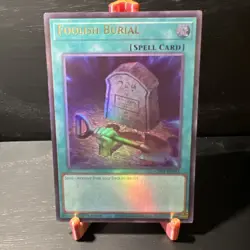 Foolish Burial - CH01-EN031 - NM - Ultra Rare - 1st ed - Yugioh - Image 1
