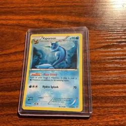 2015 POKEMON XY ANCIENT ORIGINS 22 VAPOREON-HOLO COSMOS-TRIPLE EFFECT TIN - Image 1