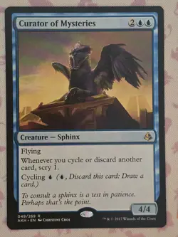 ​Curator of Mysteries - Amonkhet - Near Mint EN MTG​ - Image 1