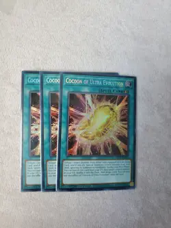 Yu-Gi-Oh! 3x Cocoon of Ultra Evolution. Secret Rare. LDS1-ENO73. NEAR MINT. - Image 1