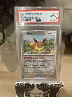 PSA GEM 10 2025 POKEMON PRE EN-PRISMATIC EVOLUTIONS #074 EEVEE POKEMON DAY 2025 - Image 1