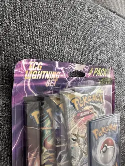 pokemon tcg lightning set 4 pack + Pokemon lono Premium Tournament Collection - Image 3