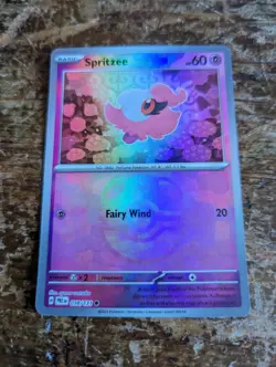 Pokemon Spritzee 038/131 Master Ball Holo Prismatic Evolutions Common Card Foil - Image 1