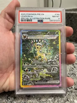 2025 POKEMON PRE EN-PRISMATIC EVOLUTIONS #144 LEAFEON EX PSA 8 - Image 1