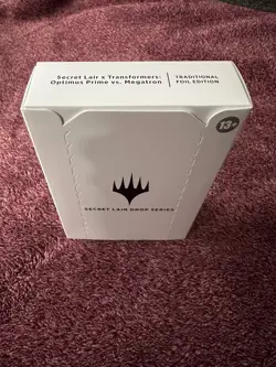 MTG Secret Lair Transformers: Optimus Prime vs. Megatron FOIL - Image 3