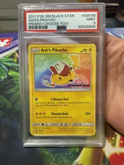 Ash's Pikachu Black Star Promo SM108 Pokemon Card PSA Graded 9 MINT - Image 1