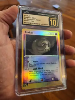 (POP 1) CGC 10 PRISTINE Duskull Reverse Holo EX Sandstorm 62/100 Pokemon Card - Image 1