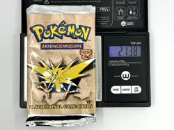 21.38 g 1st Edition Fossil Zapdos Pokemon TCG Sealed Booster Pack HEAVY - Image 1