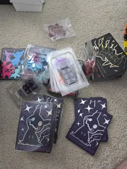 Pokemon Card Lot Featuring Commons Sleeves Player Guides and More - Image 5