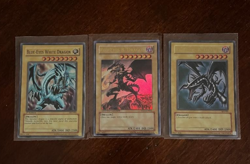 3 Card Rare Yugioh Lot 2 Red-Eyes B. Dragon LE Anniversary & Unlimted Blue-Eyes - Image 1