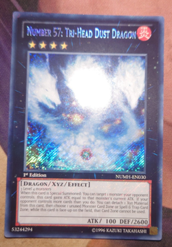 Number 57: Tri-Head Dust Dragon NUMH-EN030 Secret Rare 1st Edition Yu-Gi-Oh! - Image 1