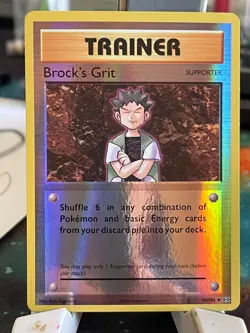 POKEMON BROCK'S GRIT 74/108 UNCOMMON REVERSE HOLOFOIL EVOLUTIONS NM CARD - Image 1