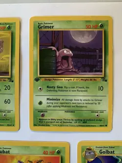 1st Edition Fossil Pokemon Card Lot - Weezing, Zubat, Grimer, Golbat, Ekans - Image 3