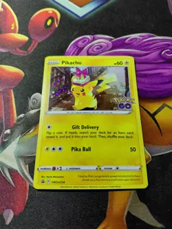 Pokemon Pikachu SWSH234 Comso's Holo Black Star Promo Pokemon Go 2022 NM - Image 1