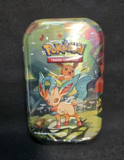 Pokemon TCG Scarlet & Violet Prismatic Evolutions Mini Tin Sealed - Leafeon - Image 1