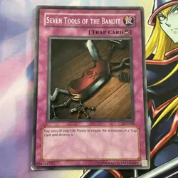Yu-Gi-Oh! Seven Tools of The Bandit Common SDJ-048 Moderately Played Unlimited - Image 1
