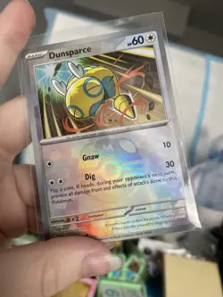 Dunsparce 079/131 Masterball Reverse Holo Prismatic Evolutions Pokemon Card - Image 1