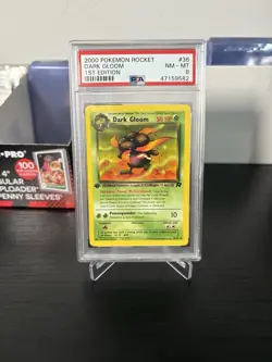 2000 Pokemon Dark Gloom Team Rocket 1st Edition PSA 8 - Image 1