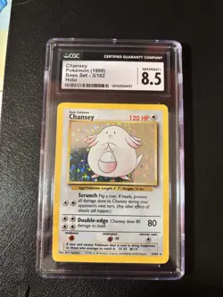 1999 POKEMON BASE SET UNLIMITED #3 CHANSEY-HOLO CGC 8.5 - Image 1