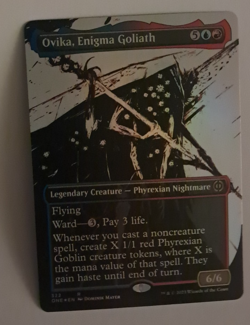Ovika, Enigma Goliath Borderless FOIL NM/M MTG Phyrexia ONE Magic the Gathering - Image 1