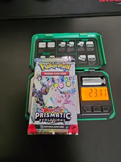 Pokemon TCG Prismatic Evolutions Booster Pack Heavy (23.11g) - BRAND NEW/ SEALED - Image 1