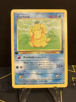 PSYDUCK Pokemon Card - WOTC - 1st Edition - Team Rocket - 65/82 - NM - Image 1