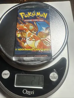 1999 Pokemon Base Set Unlimited Edition Booster Pack Charizard Sealed 21G - Image 1