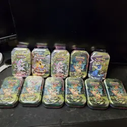 11 NEW Sealed prismatic mini tins Pokemon Prismatic Evolutions - Image 1