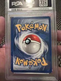 PSA 7 Pokemon 2000 Team Rocket ‘Here Comes Team Rocket!’ Holo 1st Ed #15 - Image 2