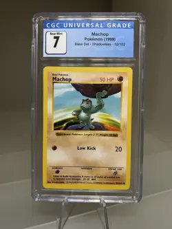 1999 Pokemon Base Set Machop Shadowless #52 CGC 7 Near Mint - Image 1