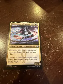 Queza, Augur of Agonies Streets of New Capenna Regular - Image 1