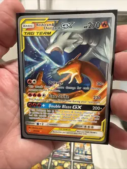Reshiram & Charizard GX 20/214 Unbroken Bonds 2019 WORLD CHAMPIONSHIP Pokemon - Image 1