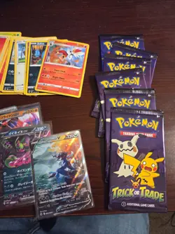 Pokemon Card lot, over 100 cards, includes 6 unopened trick or trade packs - Image 1