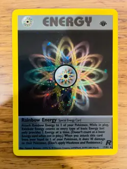NEAR MINT! 1st Edition Rainbow Energy (17/82) Team Rocket Set Holo Pokemon Card! - Image 1