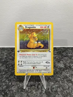 1999 POKEMON CARD DRAGONITE FOSSIL 1ST EDITION #4/62 -HOLO PLAYED HEAVY - Image 1