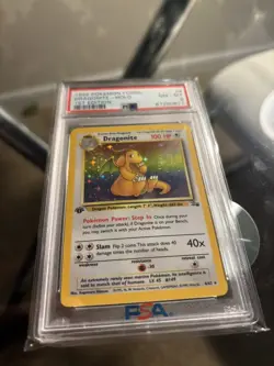 1999 Pokemon Dragonite 1st Edition Holo 4/62 Fossil PSA 8 - Image 3