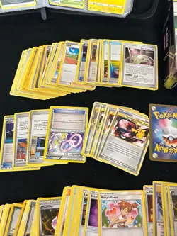 Lot of Previously Owned Pokemon Cards Includes A GX Tag Team Tin and Binder - Image 3