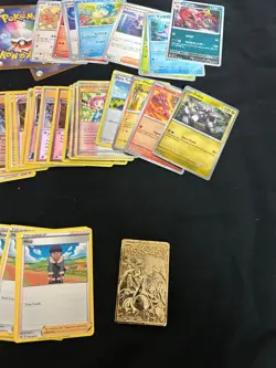 Lot of Previously Owned Pokemon Cards Includes A GX Tag Team Tin and Binder - Image 5