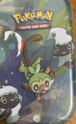 Pokemon TCG Mini Tin - Grookey & Wooloo Artwork - Factory Sealed - Dented Tin - Image 1