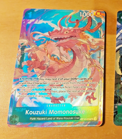 ONE PIECE ENGLISH CARTE GAME HOLO CARTE Kouzuki Momonosuke OP10-028 ALT EN MINT - Image 1