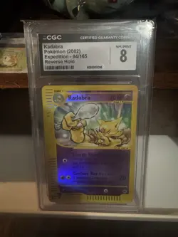 2002 Pokemon Expedition Set Kadabra Reverse Holo #84 CGC 8 Graded Pokemon Card - Image 1