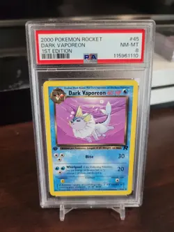 2000 POKEMON ROCKET 1ST ED #45 DARK VAPOREON PSA 8 - Image 1