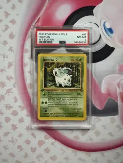 1999 POKEMON JUNGLE #57 NIDORAN PSA 8 - Image 1