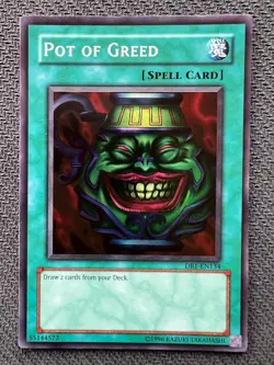 Yugioh Pot of Greed Unlimited Edition Super Rare DB1-EN134 NM - Image 1