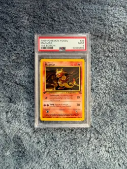1999 Pokemon Fossil Magmar 1st Edition #39 PSA 9 - Image 1