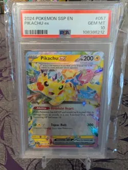 2024 POKEMON SSP EN-SURGING SPARKS #057 PIKACHU EX PSA 10 - Image 1