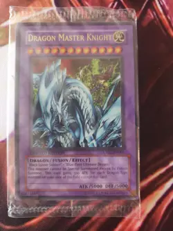 Yugioh DRAGON MASTER KNIGHT UE02-EN001 ULTRA RARE FACTORY SEALED - Image 1